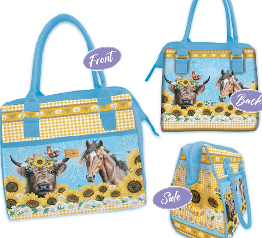 Tote bag with cow and sunflower design on a pastel striped background